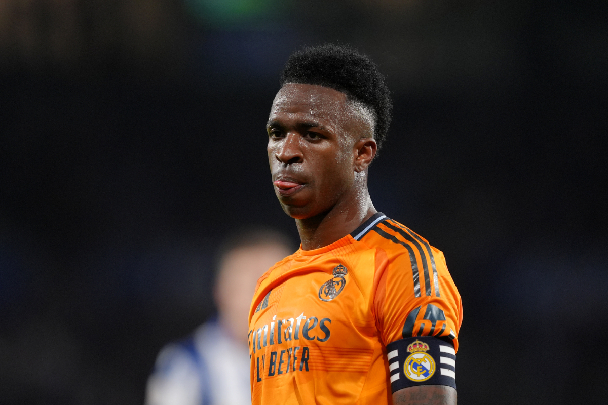 SAN SEBASTIAN, SPAIN - FEBRUARY 26: Vinicius Junior of Real Madrid reacts during the Copa del Rey Semi Final match between Real Sociedad and Real Madrid at Reale Arena on February 26, 2025 in San Sebastian, Spain. (Photo by Juan Manuel Serrano Arce/Getty Images)