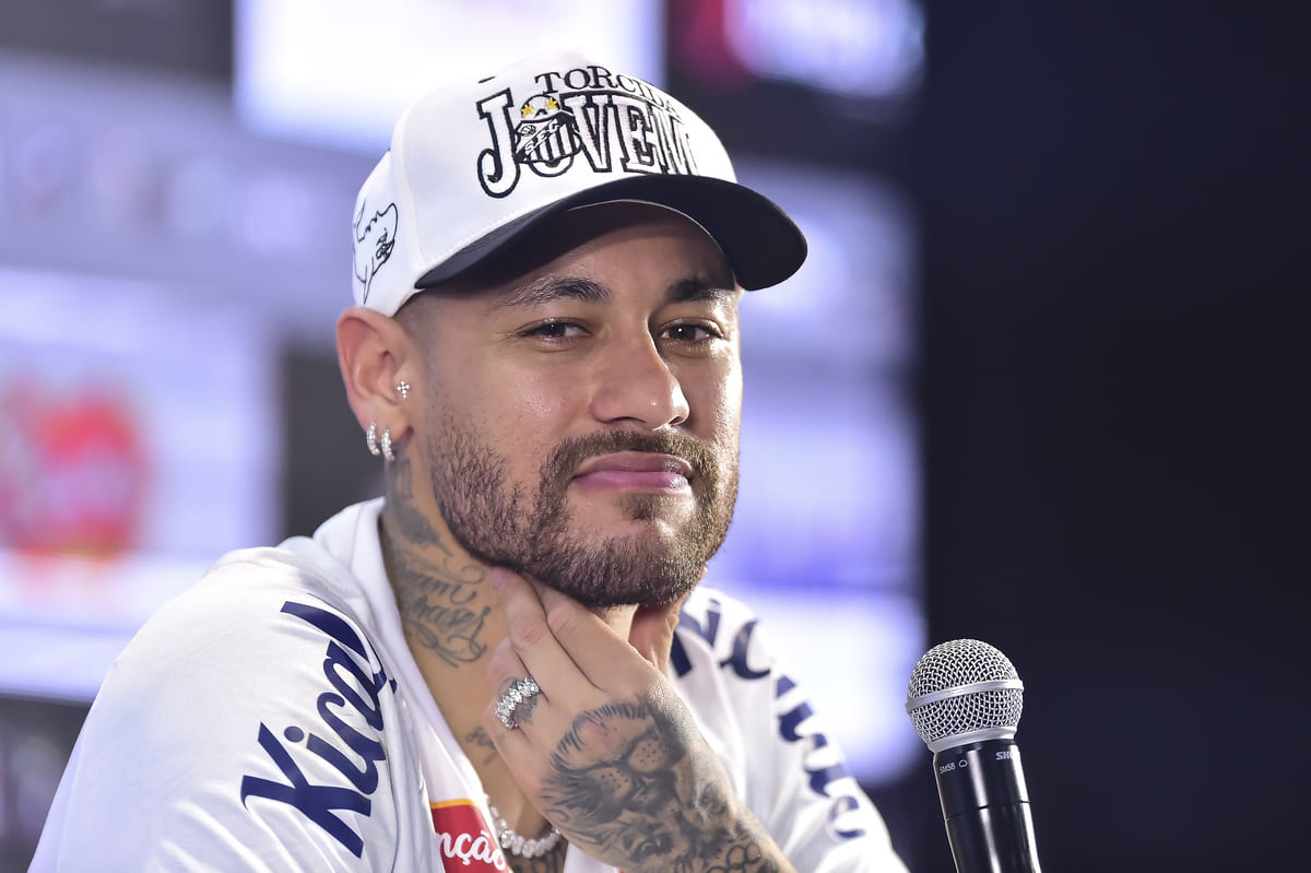 SANTOS, BRAZIL - JANUARY 31: Neymar Jr. gestures during a press conference after his unveiling as the new player of Santos at Urbano Caldeira Stadium (Vila Belmiro) on January 31, 2025 in Santos, Brazil. The Brazilian striker returns to his boyhood club, 12 years after he first left to join Barcelona. (Photo by Mauro Horita/Getty Images)