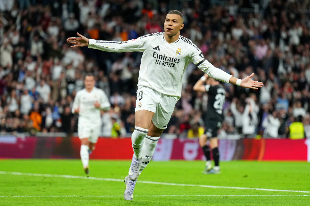 MADRID, SPAIN - MARCH 29: Kylian Mbappé of Real Madrid celebrates scoring his team's first goal from the penalty spot during the LaLiga match between Real Madrid CF and CD Leganes at Estadio Santiago Bernabeu on March 29, 2025 in Madrid, Spain. (Photo by Angel Martinez/Getty Images)