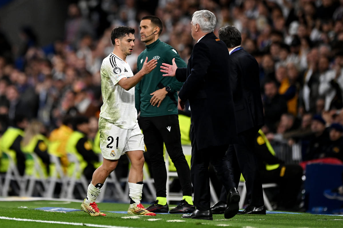 MADRID, SPAIN - MARCH 04: Carlo Ancelotti, Head Coach of Real Madrid, congratulates Brahim Diaz of Real Madrid as he is substituted during the UEFA Champions League 2024/25 Round of 16 first leg match between Real Madrid C.F. and Atletico de Madrid at Santiago Bernabeu Stadium on March 04, 2025 in Madrid, Spain. (Photo by Denis Doyle/Getty Images)