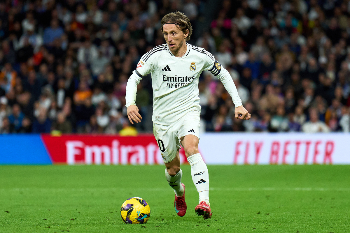 MADRID, SPAIN - MARCH 29: Luka Modric of Real Madrid runs with the ball during the LaLiga match between Real Madrid CF and CD Leganes at Estadio Santiago Bernabeu on March 29, 2025 in Madrid, Spain. (Photo by Angel Martinez/Getty Images)