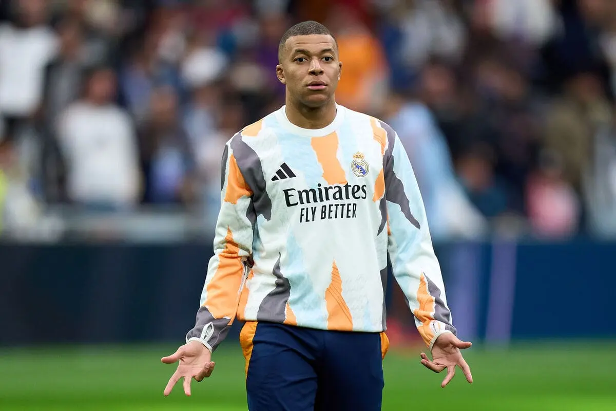 MADRID, SPAIN - MARCH 09: Kylian Mbappe of Real Madrid looks on prior to the LaLiga match between Real Madrid CF and Rayo Vallecano at Estadio Santiago Bernabeu on March 09, 2025 in Madrid, Spain. (Photo by Angel Martinez/Getty Images).