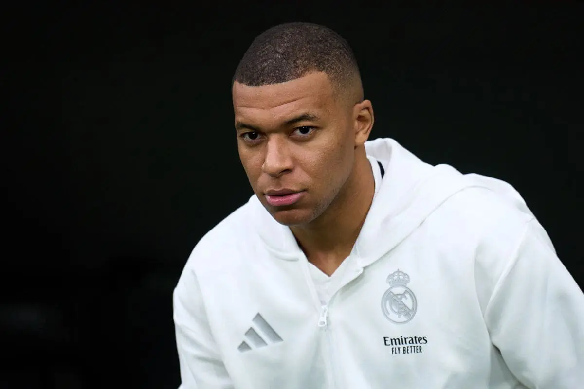 MADRID, SPAIN - MARCH 09: Kylian Mbappe of Real Madrid looks on prior to the LaLiga match between Real Madrid CF and Rayo Vallecano at Estadio Santiago Bernabeu on March 09, 2025 in Madrid, Spain. (Photo by Angel Martinez/Getty Images).