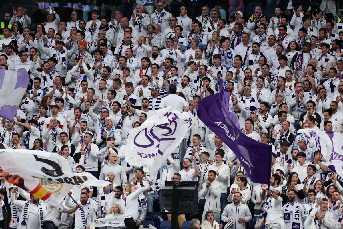 MADRID, SPAIN - MARCH 09: Fans of Real Madrid CF show their support during the LaLiga match between Real Madrid CF and Rayo Vallecano at Estadio Santiago Bernabeu on March 09, 2025 in Madrid, Spain. (Photo by Florencia Tan Jun/Getty Images)