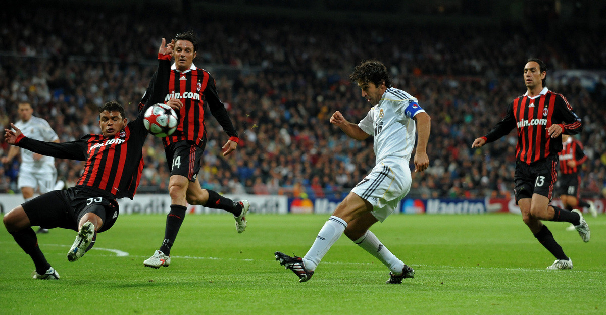 MADRID, SPAIN - OCTOBER 21: Raul Gonzalez (2nd R) of Real Madrid shoots on goal in between AC Milan players Alessandro Nesta (R), Thiago Silva (L) and Massimo Oddo during the Champions League group C match between Real Madrid and AC Milan at the Estadio Santiago Bernabeu on October 21, 2009 in Madrid, Spain. AC Milan won the match 3-2. (Photo by Jasper Juinen/Getty Images)
