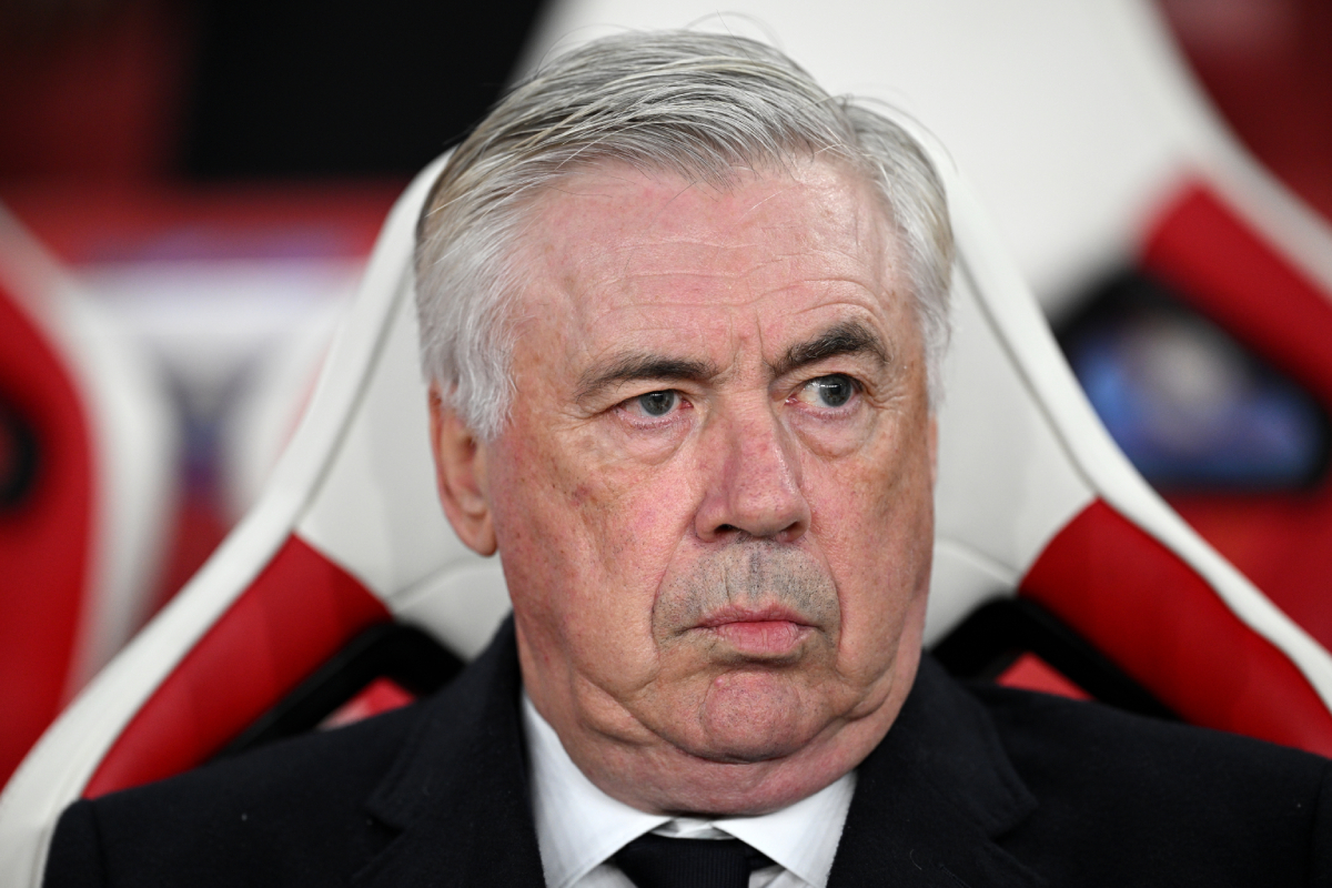 LONDON, ENGLAND - APRIL 08: Carlo Ancelotti, Head Coach of Real Madrid, looks on from the dug out prior to the UEFA Champions League 2024/25 Quarter Final First Leg match between Arsenal FC and Real Madrid C.F. at Emirates Stadium on April 08, 2025 in London, England. (Photo by Justin Setterfield/Getty Images)