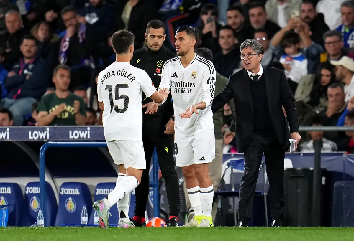GETAFE, SPAIN - APRIL 23: Dani Ceballos of Real Madrid interacts with teammate Arda Gueler as he leaves the pitch during the LaLiga match between Getafe CF and Real Madrid CF at Coliseum Alfonso Perez on April 23, 2025 in Getafe, Spain. (Photo by Aitor Alcalde/Getty Images)