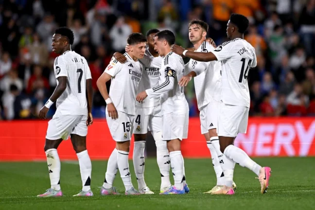 GETAFE, SPAIN - APRIL 23: Arda Gueler of Real Madrid celebrates scoring his team's first goal with teammates during the LaLiga match between Getafe CF and Real Madrid CF at Coliseum Alfonso Perez on April 23, 2025 in Getafe, Spain. (Photo by Denis Doyle/Getty Images)