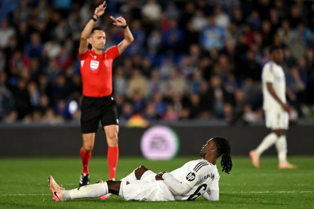 GETAFE, SPAIN - APRIL 23: Eduardo Camavinga of Real Madrid reacts on the floor with a injury during the LaLiga match between Getafe CF and Real Madrid CF at Coliseum Alfonso Perez on April 23, 2025 in Getafe, Spain. (Photo by Denis Doyle/Getty Images)