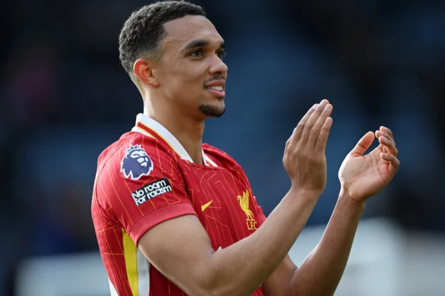LEICESTER, ENGLAND - APRIL 20: Trent Alexander-Arnold of Liverpool acknowledges the fans after the Premier League match between Leicester City FC and Liverpool FC at The King Power Stadium on April 20, 2025 in Leicester, England. (Photo by Shaun Botterill/Getty Images)