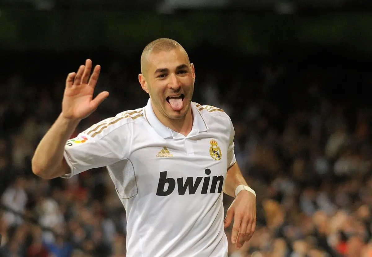 MADRID, SPAIN - MARCH 18: Karim Benzema of Real Madrid celebrates after scoring Real's opening goal during the La Liga match between Real Madrid CF and Malaga CF at Estadio Santiago Bernabeu on March 18, 2012 in Madrid, Spain. (Photo by Denis Doyle/Getty Images).
