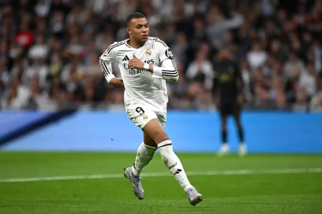 MADRID, SPAIN - APRIL 05: Kylian Mbappe of Real Madrid runs off the ball during the LaLiga match between Real Madrid CF and Valencia CF at Estadio Santiago Bernabeu on April 05, 2025 in Madrid, Spain. (Photo by Denis Doyle/Getty Images)
