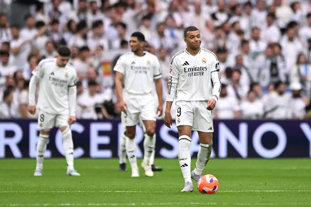 MADRID, SPAIN - APRIL 05: Kylian Mbappe of Real Madrid reacts after Mouctar Diakhaby of Valencia CF (not pictured) scores his team's first goal during the LaLiga match between Real Madrid CF and Valencia CF at Estadio Santiago Bernabeu on April 05, 2025 in Madrid, Spain. (Photo by Denis Doyle/Getty Images)