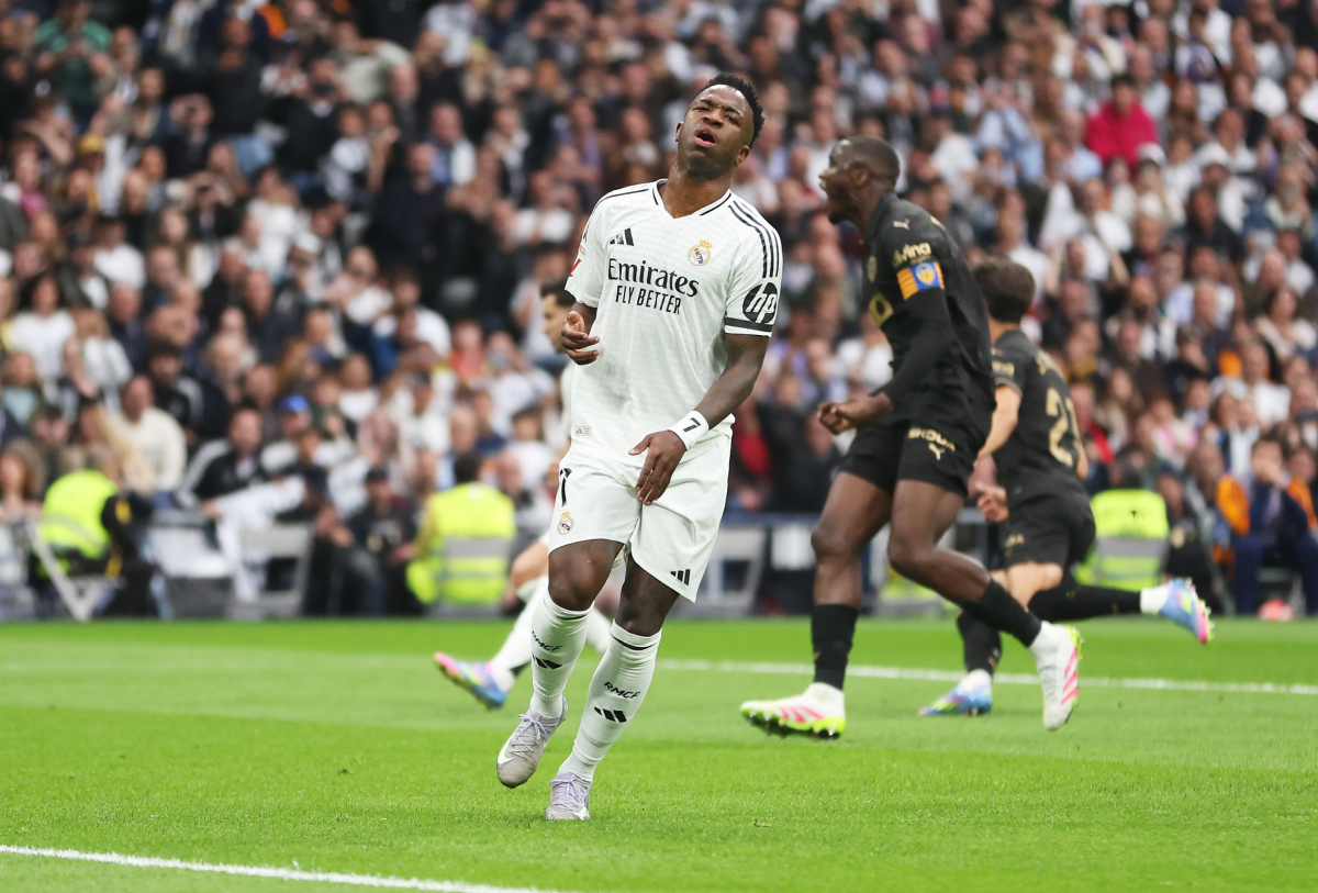 MADRID, SPAIN - APRIL 05: Vinicius Jr. of Real Madrid reacts during the LaLiga match between Real Madrid CF and Valencia CF at Estadio Santiago Bernabeu on April 05, 2025 in Madrid, Spain. (Photo by Florencia Tan Jun/Getty Images)