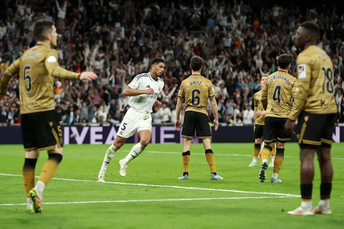 MADRID, SPAIN - APRIL 01: Jude Bellingham of Real Madrid celebrates after he scores his teams second goal during the Copa del Rey semifinal match between Real Madrid and Real Sociedad at Estadio Santiago Bernabeu on April 01, 2025 in Madrid, Spain. (Photo by Florencia Tan Jun/Getty Images).