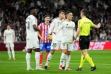MADRID, SPAIN - FEBRUARY 08: Aurelien Tchouameni, Raul Asencio and Lucas Vazquez of Real Madrid react towards Referee Cesar Soto Grado during the LaLiga match between Real Madrid CF and Atletico de Madrid at Estadio Santiago Bernabeu on February 08, 2025 in Madrid, Spain. (Photo by Angel Martinez/Getty Images)