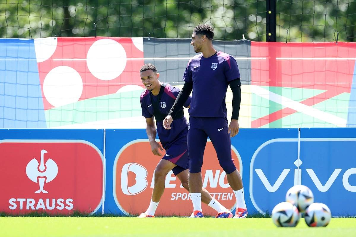 BLANKENHAIN, GERMANY - JULY 13: Trent Alexander-Arnold of England interacts with Jude Bellingham during the England Training Session ahead of the UEFA EURO 2024 final match between Spain and England at Spa & Golf Resort Weimarer Land on July 13, 2024 in Blankenhain, Germany. (Photo by Richard Pelham/Getty Images)
