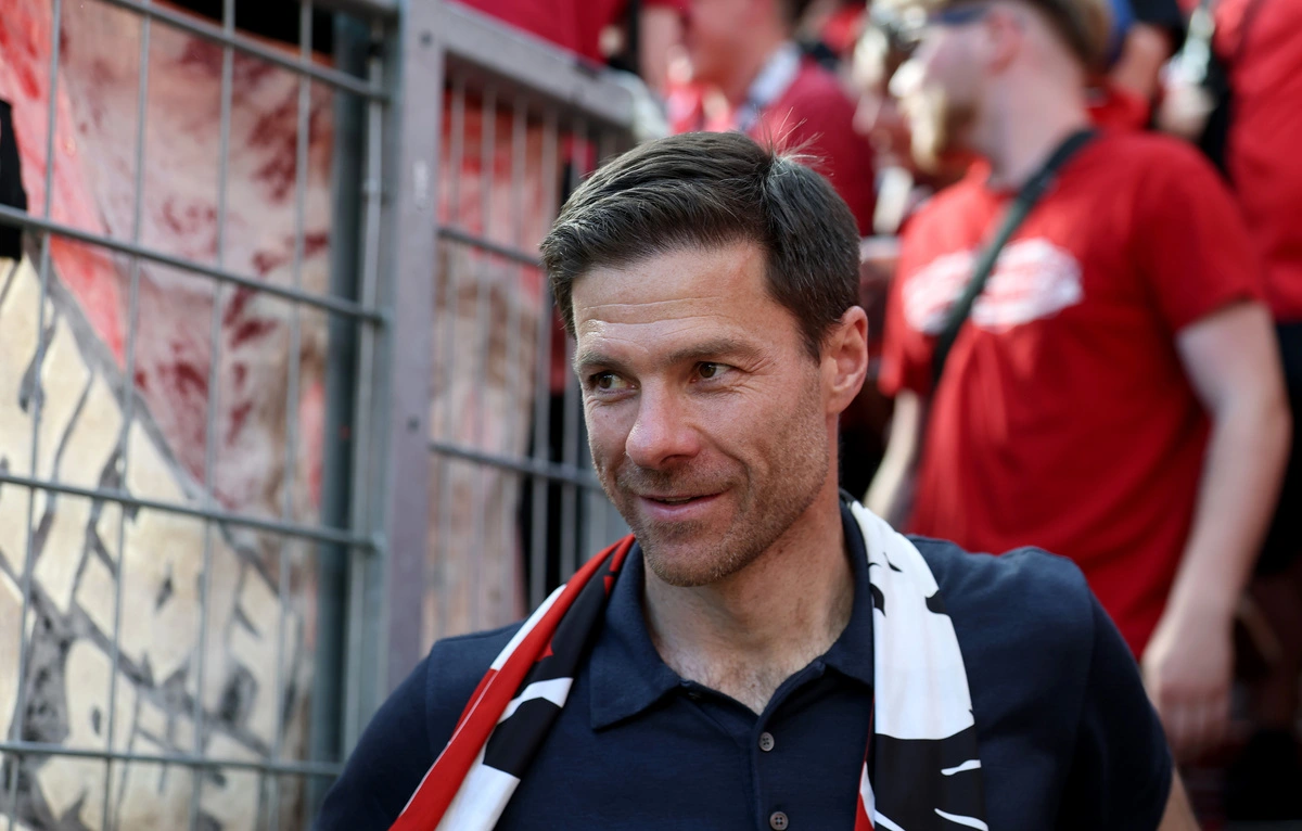 LEVERKUSEN, GERMANY - MAY 11: Xabi Alonso, Head Coach of Bayer 04 Leverkusen, celebrates with fans after the Bundesliga match between Bayer 04 Leverkusen and Borussia Dortmund at BayArena on May 11, 2025 in Leverkusen, Germany. (Photo by Lars Baron/Getty Images)