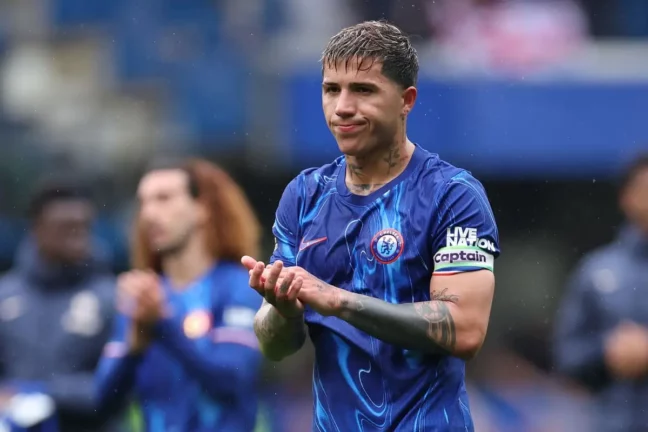 LONDON, ENGLAND - APRIL 13: Enzo Fernandez of Chelsea applauds the fans following the draw in the Premier League match between Chelsea FC and Ipswich Town FC at Stamford Bridge on April 13, 2025 in London, England. (Photo by Harry Murphy/Getty Images).