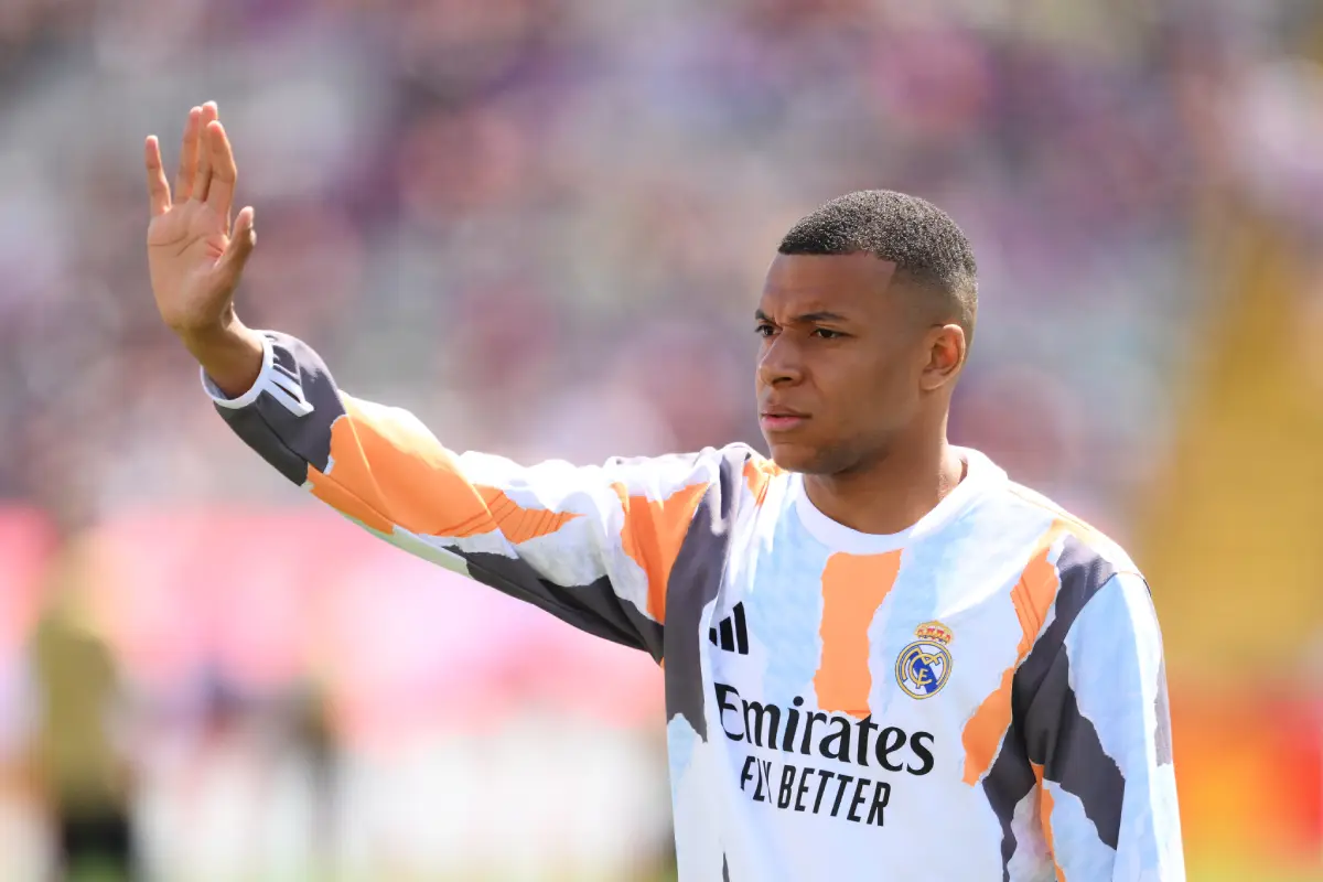 BARCELONA, SPAIN - MAY 11: Kylian Mbappe of Real Madrid gestures during the warm up prior to the LaLiga match between FC Barcelona and Real Madrid CF at Estadi Olimpic Lluis Companys on May 11, 2025 in Barcelona, Spain. (Photo by David Ramos/Getty Images)