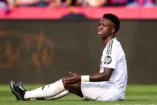 BARCELONA, SPAIN - MAY 11: Vinicius Junior of Real Madrid CF reacts during the LaLiga match between FC Barcelona and Real Madrid CF at Estadi Olimpic Lluis Companys on May 11, 2025 in Barcelona, Spain. (Photo by Alex Caparros/Getty Images)