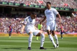 BARCELONA, SPAIN - MAY 11: Kylian Mbappe of Real Madrid celebrates scoring his team's first goal with teammate Jude Bellingham during the LaLiga match between FC Barcelona and Real Madrid CF at Estadi Olimpic Lluis Companys on May 11, 2025 in Barcelona, Spain. (Photo by David Ramos/Getty Images).