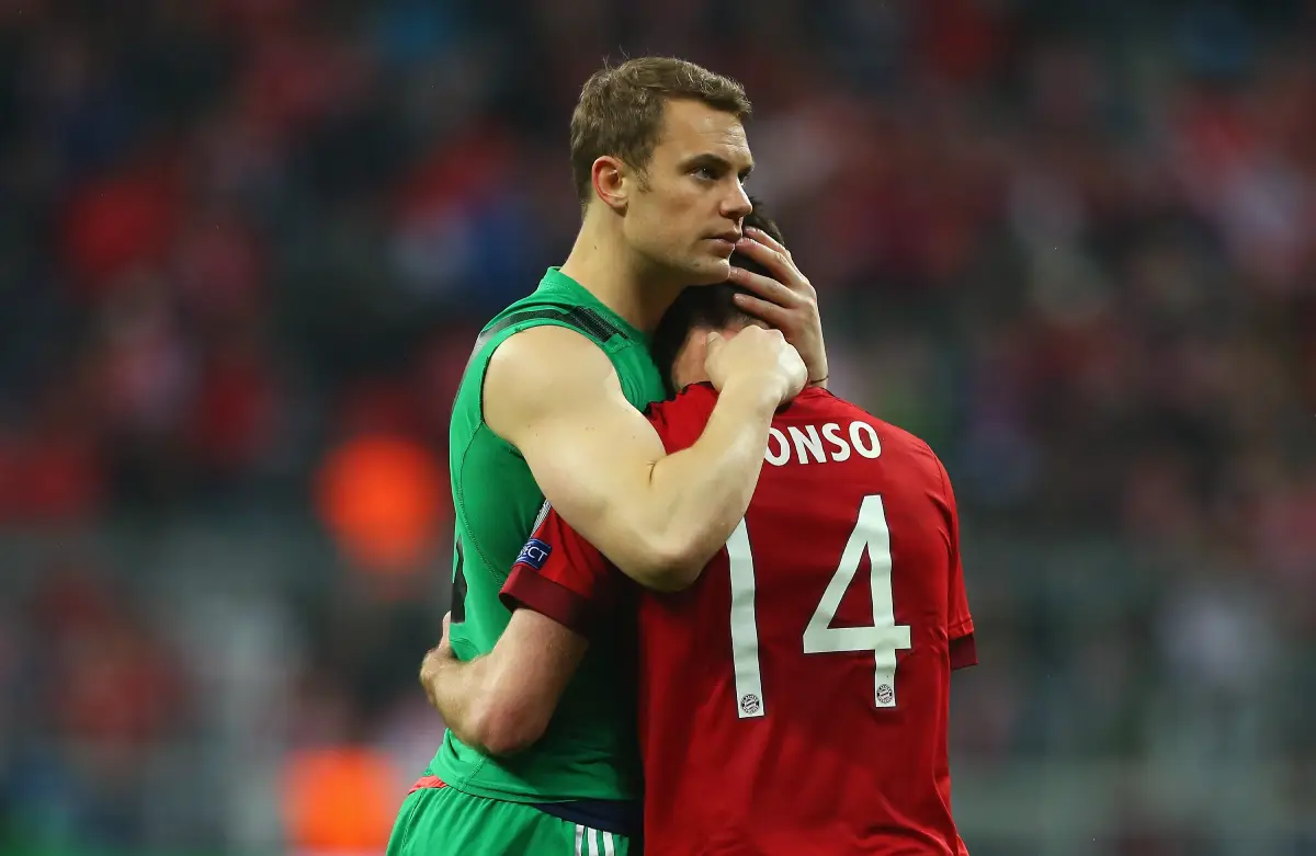 MUNICH, GERMANY - MAY 03: Xabi Alonso (14) and Manuel Neuer of Bayern Munich look dejected after the UEFA Champions League semi final second leg match between FC Bayern Muenchen and Club Atletico de Madrid at Allianz Arena on May 3, 2016 in Munich, Germany. Bayern Munich won the match 2-1, but Atletico Madrid reached the final on the away goals rule. (Photo by Alexander Hassenstein/Bongarts/Getty Images)