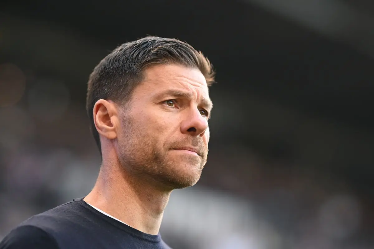 HAMBURG, GERMANY - APRIL 20: Xabi Alonso, Head Coach of Bayer 04 Leverkusen, looks on prior to the Bundesliga match between FC St. Pauli 1910 and Bayer 04 Leverkusen at Millerntor Stadium on April 20, 2025 in Hamburg, Germany. (Photo by Stuart Franklin/Getty Images).
