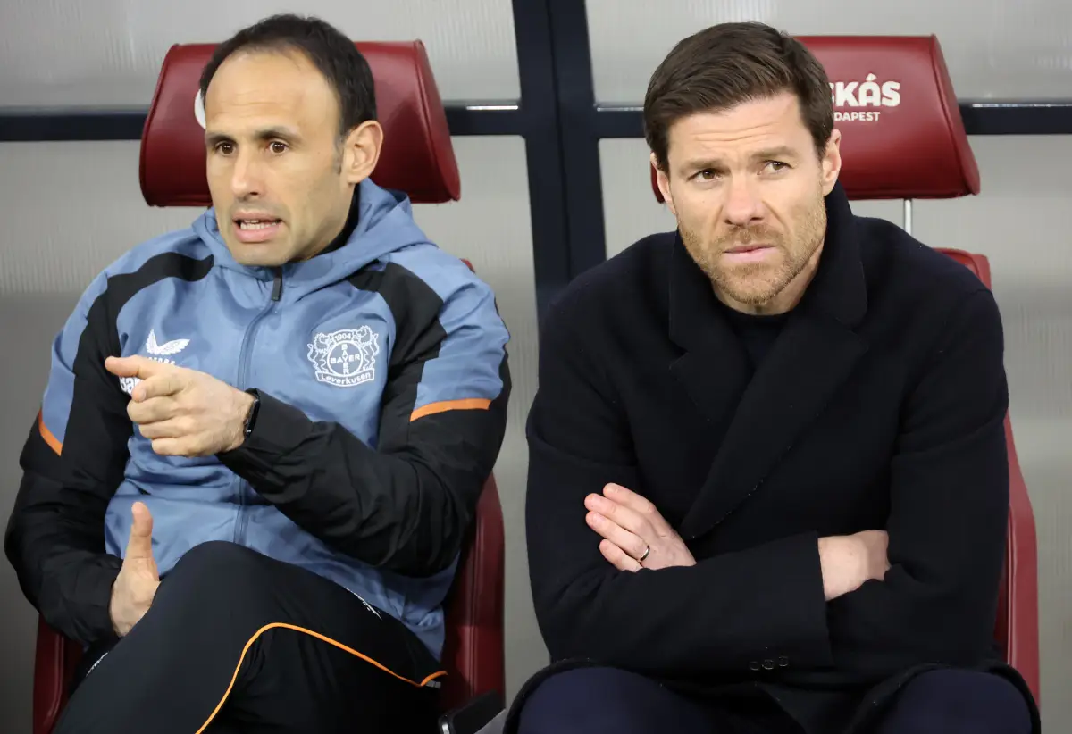 BUDAPEST, HUNGARY - MARCH 16: Sebastián Parrilla, Assistant Head Coach of Bayer 04 Leverkusen and Xabi Alonso, Head Coach of Bayer 04 Leverkusen, look on prior to the UEFA Europa League round of 16 leg two match between Ferencvarosi TC and Bayer 04 Leverkusen at Puskas Arena on March 16, 2023 in Budapest, Hungary. (Photo by Laszlo Szirtesi/Getty Images)