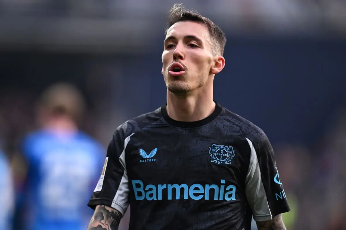 KIEL, GERMANY - FEBRUARY 22: Alejandro Grimaldo of Bayer 04 Leverkusen reacts during the Bundesliga match between Holstein Kiel and Bayer 04 Leverkusen at Holstein-Stadion on February 22, 2025 in Kiel, Germany. (Photo by Oliver Hardt/Getty Images)