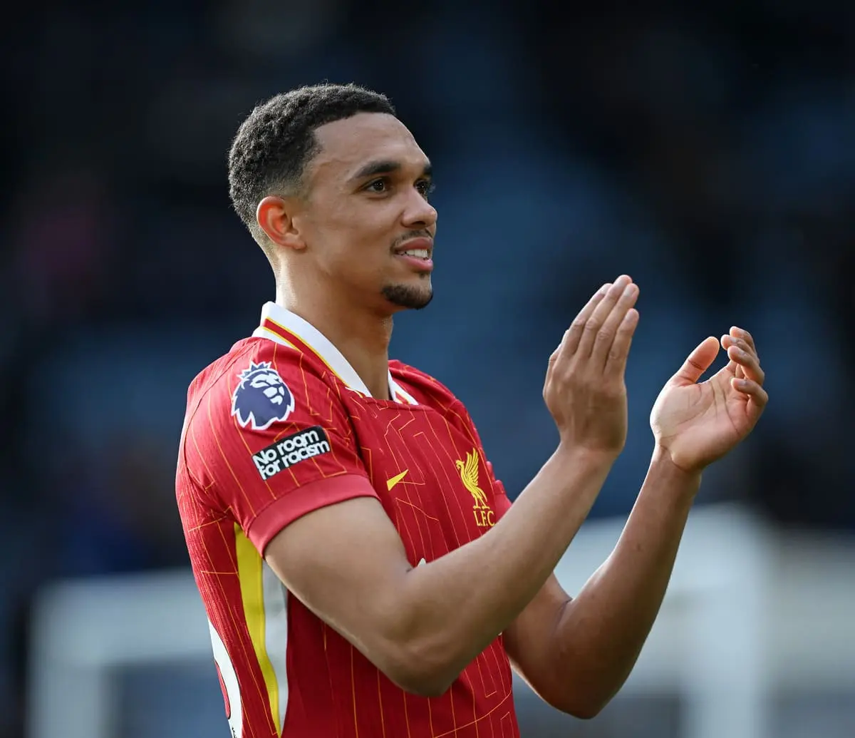 LEICESTER, ENGLAND - APRIL 20: Trent Alexander-Arnold of Liverpool acknowledges the fans after the Premier League match between Leicester City FC and Liverpool FC at The King Power Stadium on April 20, 2025 in Leicester, England. (Photo by Shaun Botterill/Getty Images).