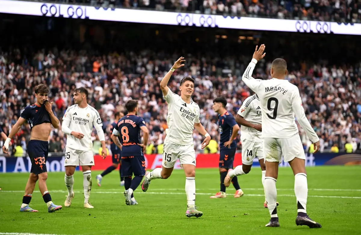MADRID, SPAIN - MAY 04: Arda Gueler of Real Madrid celebrates scoring his team's first goal with teammate Kylian Mbappe during the LaLiga match between Real Madrid CF and RC Celta de Vigo at Estadio Santiago Bernabeu on May 04, 2025 in Madrid, Spain. (Photo by Denis Doyle/Getty Images)