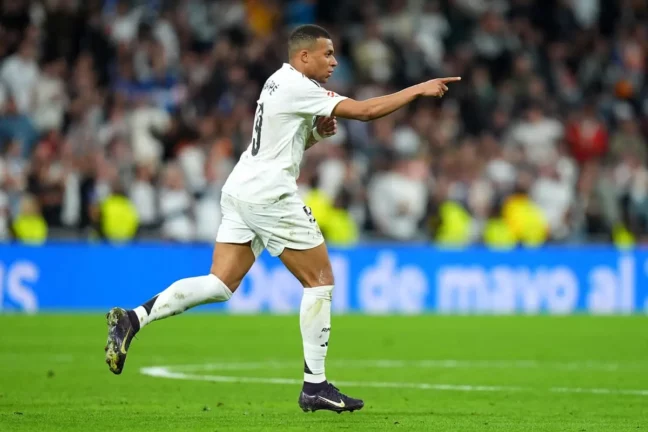 MADRID, SPAIN - MAY 14: Kylian Mbappe of Real Madrid celebrates scoring his team's first goal during the LaLiga match between Real Madrid CF and RCD Mallorca at Estadio Santiago Bernabeu on May 14, 2025 in Madrid, Spain. (Photo by Angel Martinez/Getty Images)