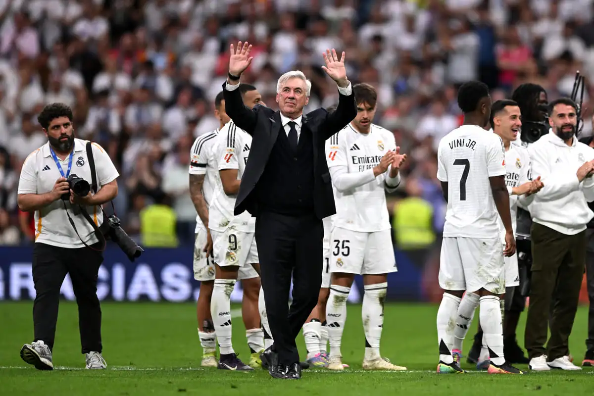 MADRID, SPAIN - MAY 24: Carlo Ancelotti, Head Coach of Real Madrid, shows appreciation to the fans after the team's victory following the LaLiga match between Real Madrid CF and Real Sociedad at Estadio Santiago Bernabeu on May 24, 2025 in Madrid, Spain. (Photo by Denis Doyle/Getty Images)