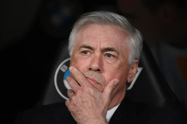 MADRID, SPAIN - APRIL 05: Carlo Ancelotti, Head Coach of Real Madrid, looks on from the dug out prior to the LaLiga match between Real Madrid CF and Valencia CF at Estadio Santiago Bernabeu on April 05, 2025 in Madrid, Spain. (Photo by Denis Doyle/Getty Images)