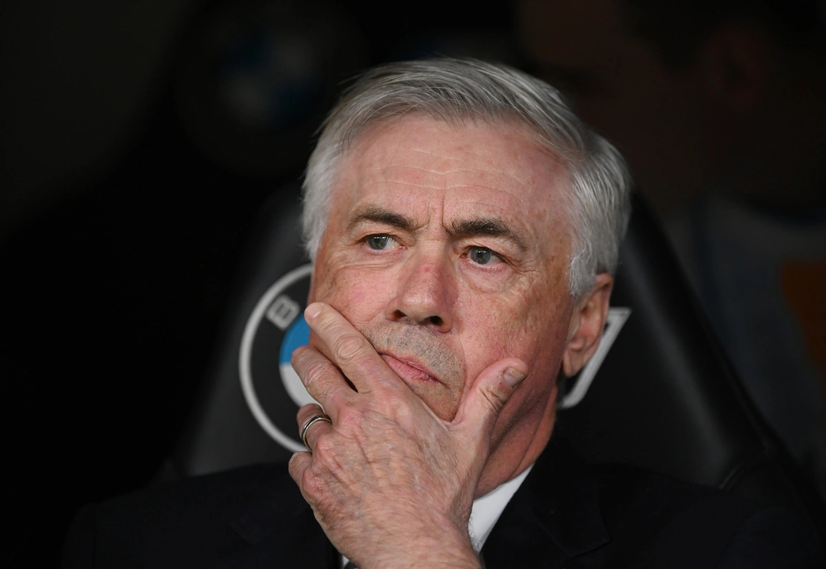 MADRID, SPAIN - APRIL 05: Carlo Ancelotti, Head Coach of Real Madrid, looks on from the dug out prior to the LaLiga match between Real Madrid CF and Valencia CF at Estadio Santiago Bernabeu on April 05, 2025 in Madrid, Spain. (Photo by Denis Doyle/Getty Images)