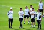MADRID, SPAIN - MAY 08: Carlo Ancelotti, Head Coach of Real Madrid, and Davide Ancelotti, Assistant Head Coach of Real Madrid, discuss during the Real Madrid training session ahead of their UEFA Champions League semi-final first leg match against Manchester City FC at Valdebebas training ground on May 08, 2023 in Madrid, Spain. (Photo by Angel Martinez/Getty Images)