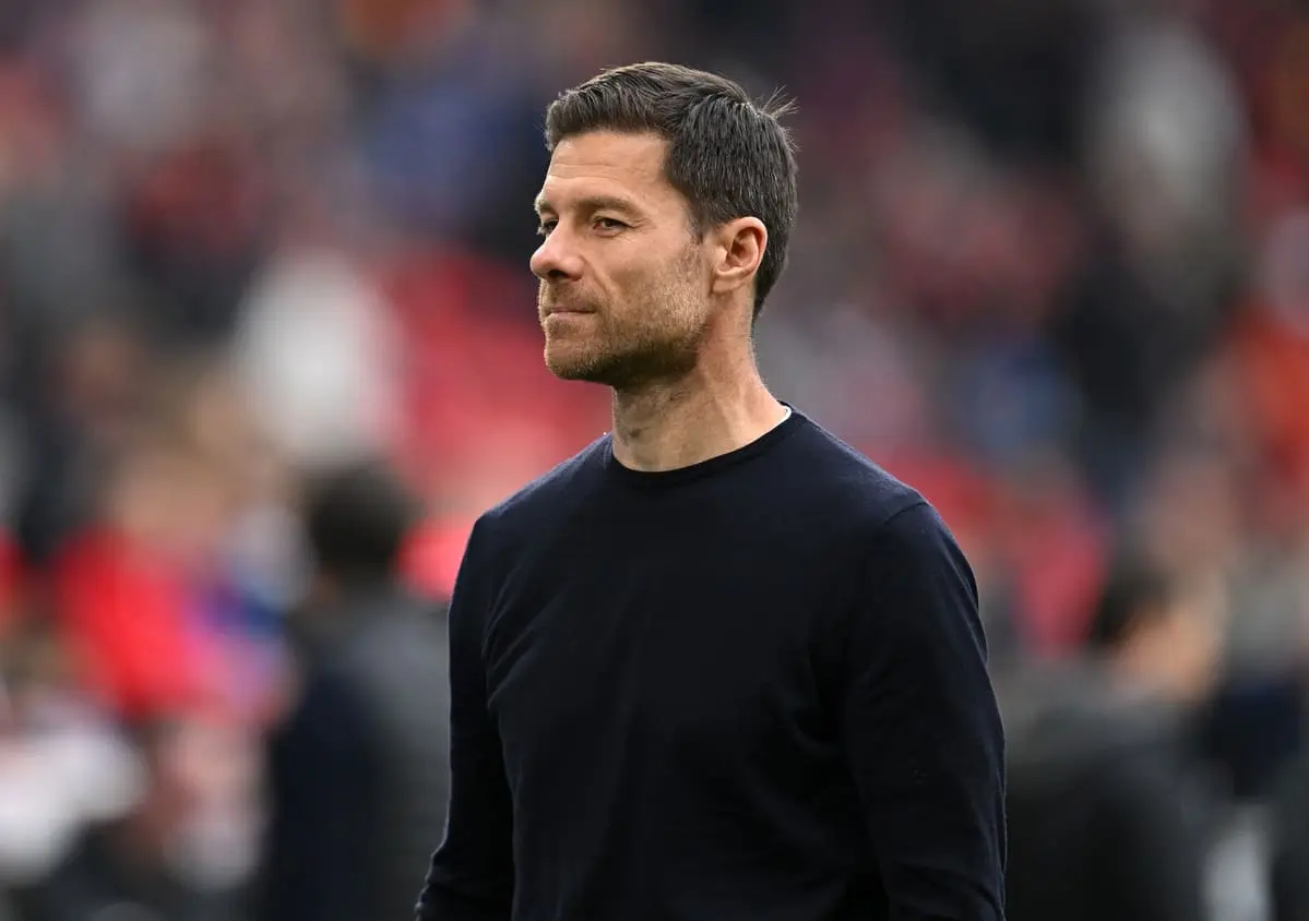 FREIBURG IM BREISGAU, GERMANY - MAY 04: Xabi Alonso, Head Coach of Bayer 04 Leverkusen, looks on prior to the Bundesliga match between Sport-Club Freiburg and Bayer 04 Leverkusen at Europa-Park Stadion on May 04, 2025 in Freiburg im Breisgau, Germany. (Photo by Daniel Kopatsch/Getty Images).