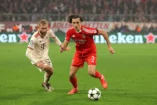 MUNICH, GERMANY - NOVEMBER 06: Alvaro Carreras of S.L Benfica is put under pressure by Konrad Laimer of Bayern Munich during the UEFA Champions League 2024/25 League Phase MD4 match between FC Bayern München and SL Benfica at Football Arena Munich on November 06, 2024 in Munich, Germany. (Photo by Alexander Hassenstein/Getty Images)