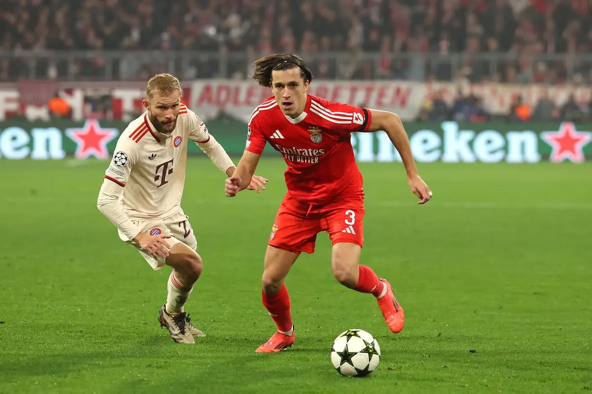 MUNICH, GERMANY - NOVEMBER 06: Alvaro Carreras of S.L Benfica is put under pressure by Konrad Laimer of Bayern Munich during the UEFA Champions League 2024/25 League Phase MD4 match between FC Bayern München and SL Benfica at Football Arena Munich on November 06, 2024 in Munich, Germany. (Photo by Alexander Hassenstein/Getty Images)