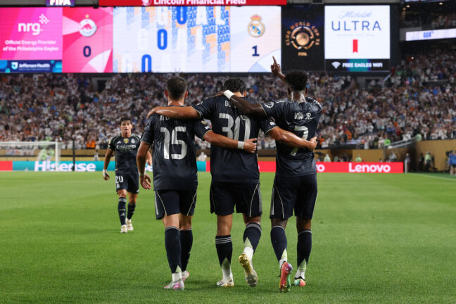 PHILADELPHIA, PENNSYLVANIA - JUNE 26: Vinicius Junior #7 of Real Madrid C.F. celebrates scoring his team's first goal with Arda Gueler #15 and Gonzalo Garcia #30 of Real Madrid C.F. during the FIFA Club World Cup 2025 group H match between FC Red Bull Salzburg and Real Madrid CF at Lincoln Financial Field on June 26, 2025 in Philadelphia, Pennsylvania. (Photo by Francois Nel/Getty Images)