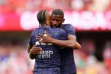 GRANADA, SPAIN - MAY 11: Antonio Ruediger of Real Madrid embraces team mate Eder Militao (obscured) prior to the LaLiga EA Sports match between Granada CF and Real Madrid CF at Estadio Nuevo Los Carmenes on May 11, 2024 in Granada, Spain. (Photo by Fran Santiago/Getty Images).