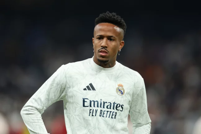 MADRID, SPAIN - NOVEMBER 05: Eder Militao of Real Madrid looks on during the warm up prior to the UEFA Champions League 2024/25 League Phase MD4 match between Real Madrid C.F. and AC Milan at Estadio Santiago Bernabeu on November 05, 2024 in Madrid, Spain.