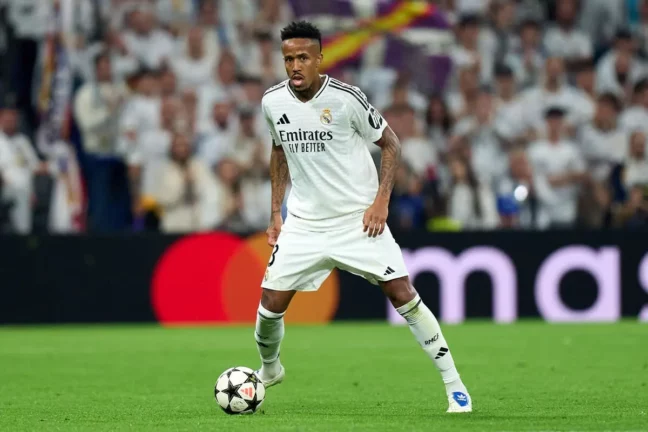 MADRID, SPAIN - NOVEMBER 05: Eder Militao of Real Madrid controls the ball during the UEFA Champions League 2024/25 League Phase MD4 match between Real Madrid C.F. and AC Milan at Estadio Santiago Bernabeu on November 05, 2024 in Madrid, Spain. (Photo by Angel Martinez/Getty Images).