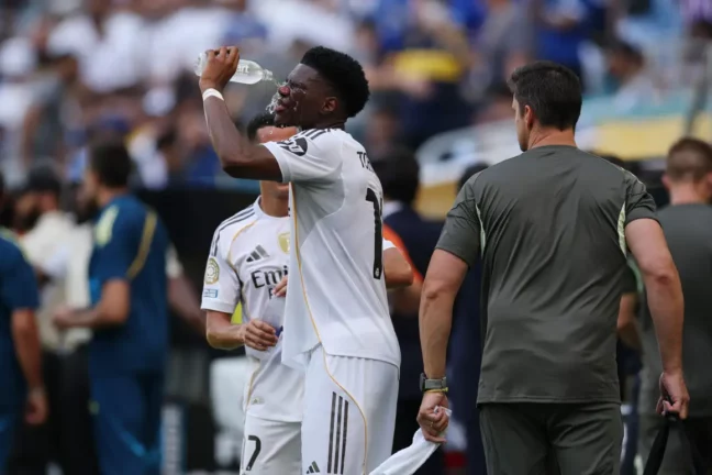 MIAMI GARDENS, FLORIDA - JUNE 18: Aurelien Tchouameni #14 of Real Madrid C. F. cools off with water during the FIFA Club World Cup 2025 group H match between Real Madrid CF and Al Hilal at Hard Rock Stadium on June 18, 2025 in Miami Gardens, Florida. (Photo by Dan Mullan/Getty Images)