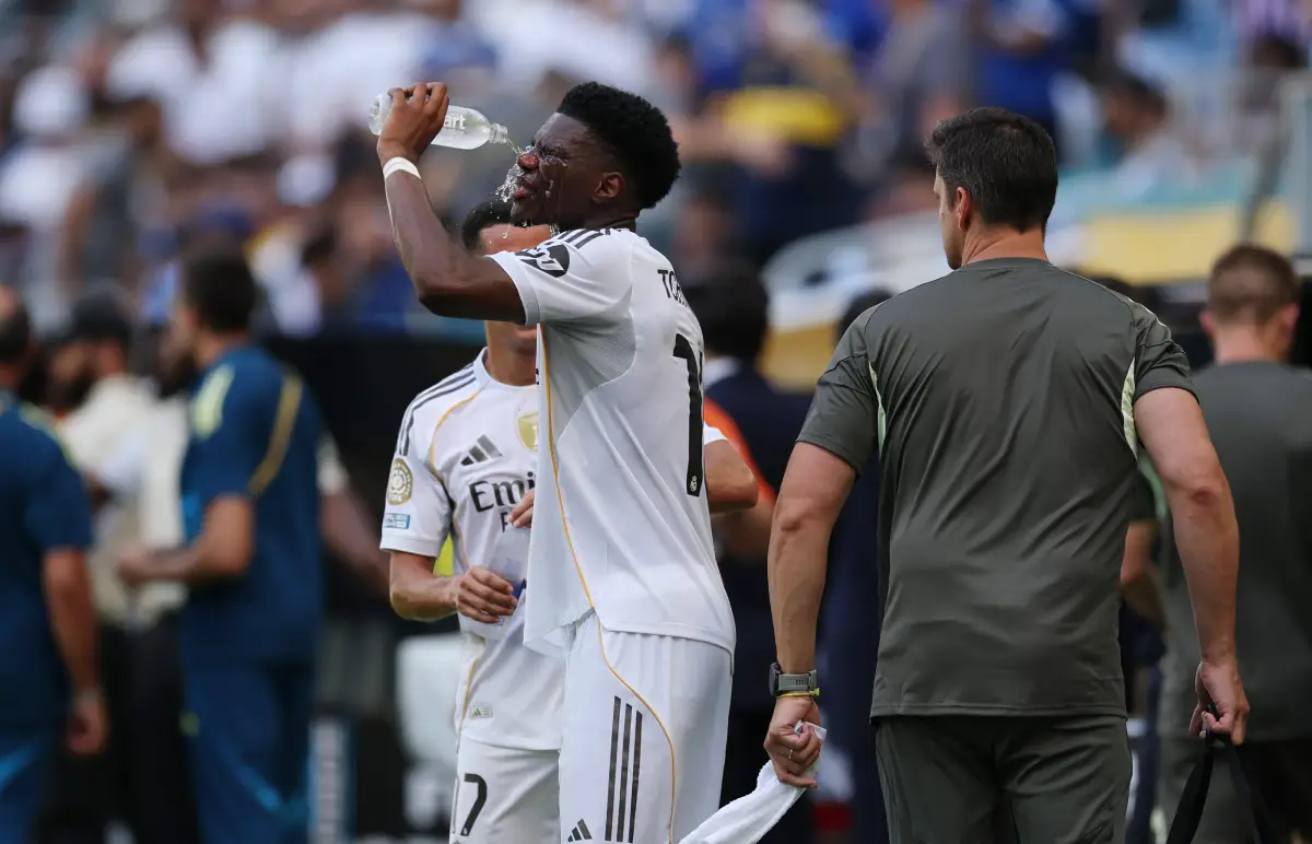 MIAMI GARDENS, FLORIDA - JUNE 18: Aurelien Tchouameni #14 of Real Madrid C. F. cools off with water during the FIFA Club World Cup 2025 group H match between Real Madrid CF and Al Hilal at Hard Rock Stadium on June 18, 2025 in Miami Gardens, Florida. (Photo by Dan Mullan/Getty Images)