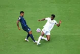 CHARLOTTE, NORTH CAROLINA - JUNE 22: Aurelien Tchouameni #14 of Real Madrid C.F. battles for possession with John Kennedy #10 of CF Pachuca during the FIFA Club World Cup 2025 group H match between Real Madrid CF and CF Pachuca at Bank of America Stadium on June 22, 2025 in Charlotte, North Carolina. (Photo by Michael Owens/Getty Images)