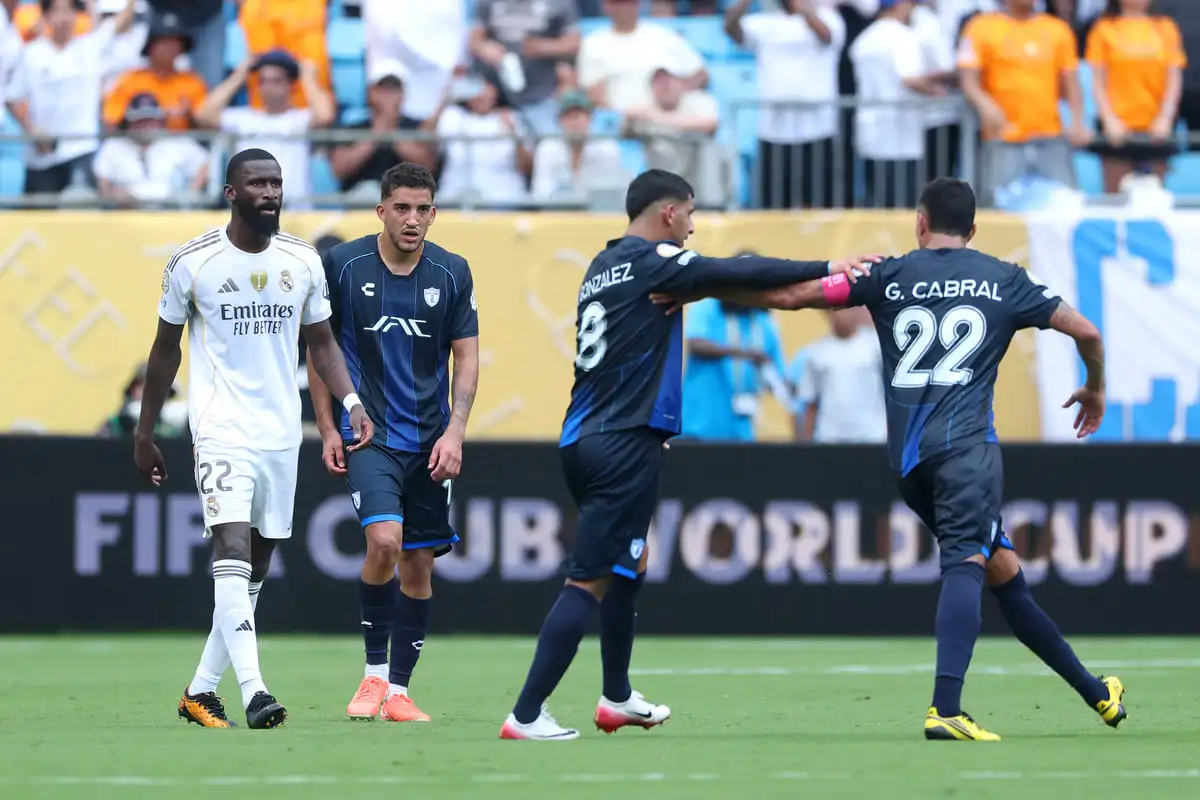 CHARLOTTE, NORTH CAROLINA - JUNE 22: Bryan Gonzalez #8 of CF Pachuca separates Antonio Ruediger #22 of Real Madrid C. F. from Gustavo Cabral #22 of CF Pachuca during an altercation in the FIFA Club World Cup 2025 group H match between Real Madrid CF and CF Pachuca at Bank of America Stadium on June 22, 2025 in Charlotte, North Carolina. (Photo by Richard Pelham/Getty Images)