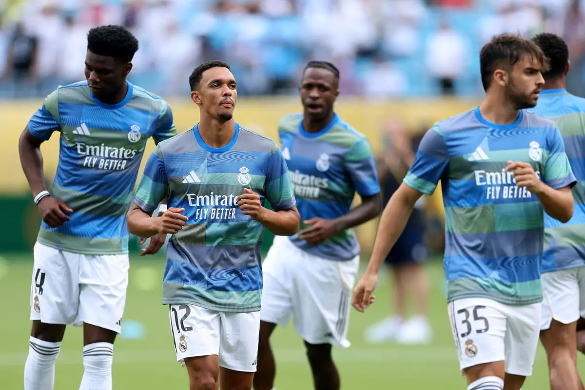 CHARLOTTE, NORTH CAROLINA - JUNE 22: Aurelien Tchouameni #14, Trent Alexander-Arnold #12 and Raul Asencio #35 of Real Madrid C. F. warm up prior to the FIFA Club World Cup 2025 group H match between Real Madrid CF and CF Pachuca at Bank of America Stadium on June 22, 2025 in Charlotte, North Carolina. (Photo by Richard Pelham/Getty Images)