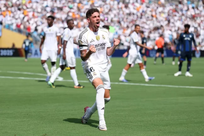 CHARLOTTE, NORTH CAROLINA - JUNE 22: Federico Valverde #8 of Real Madrid C.F. celebrates scoring his team's third goal during the FIFA Club World Cup 2025 group H match between Real Madrid CF and CF Pachuca at Bank of America Stadium on June 22, 2025 in Charlotte, North Carolina. (Photo by Michael Owens/Getty Images).